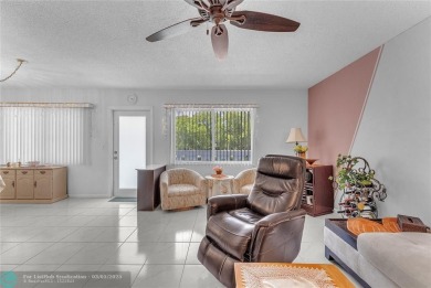 Enjoy South Florida living with this 2Bed/2Bath second floor on Hillsboro Pines Golf in Florida - for sale on GolfHomes.com, golf home, golf lot