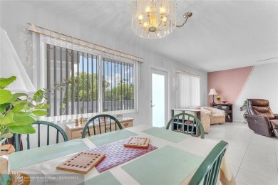 Enjoy South Florida living with this 2Bed/2Bath second floor on Hillsboro Pines Golf in Florida - for sale on GolfHomes.com, golf home, golf lot