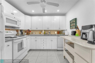 Enjoy South Florida living with this 2Bed/2Bath second floor on Hillsboro Pines Golf in Florida - for sale on GolfHomes.com, golf home, golf lot