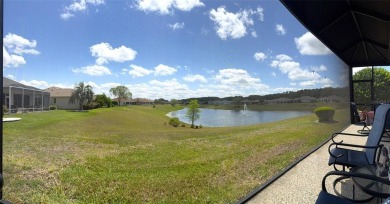 This stunning water-front single-family home at 13111 SE 86th on Eagle Ridge At Spruce Creek Country Club in Florida - for sale on GolfHomes.com, golf home, golf lot