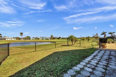 Beautifully redone and currently used as a vacation rental, this on Rotonda Golf and Country Club The Hills Course in Florida - for sale on GolfHomes.com, golf home, golf lot