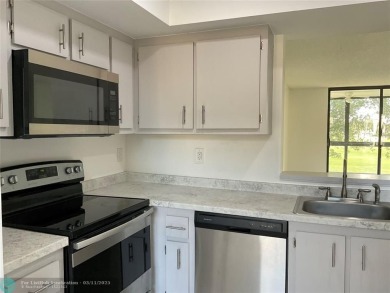 Stylish and serene 2-bedroom, 2-bathroom condo with breathtaking on Oriole Golf and Tennis Club in Florida - for sale on GolfHomes.com, golf home, golf lot