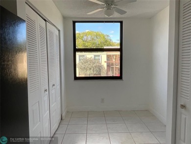 Stylish and serene 2-bedroom, 2-bathroom condo with breathtaking on Oriole Golf and Tennis Club in Florida - for sale on GolfHomes.com, golf home, golf lot