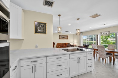 This updated first-floor condo combines comfort, security, and on Atlantis Golf Club in Florida - for sale on GolfHomes.com, golf home, golf lot
