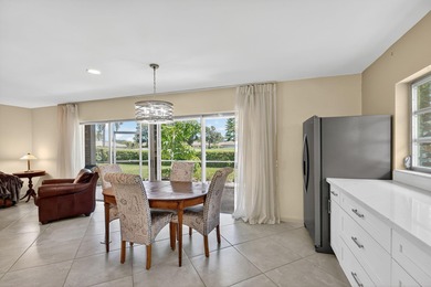 This updated first-floor condo combines comfort, security, and on Atlantis Golf Club in Florida - for sale on GolfHomes.com, golf home, golf lot