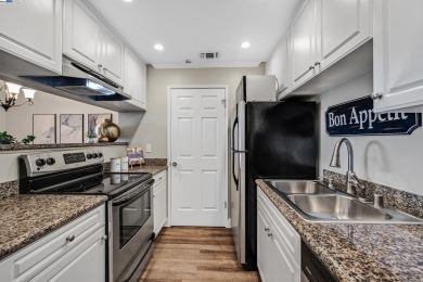 Rarely available first-floor condo in the gated Siena Hills on Canyon Lakes Country Club in California - for sale on GolfHomes.com, golf home, golf lot