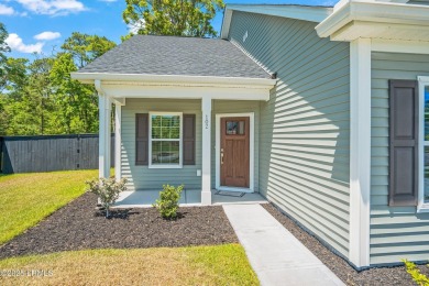 Welcome to this beautifully maintained 1 year old Carson plan- 3 on Ladys Island Country Club in South Carolina - for sale on GolfHomes.com, golf home, golf lot