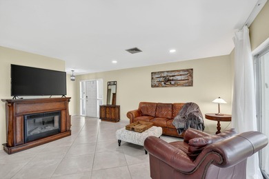 This updated first-floor condo combines comfort, security, and on Atlantis Golf Club in Florida - for sale on GolfHomes.com, golf home, golf lot