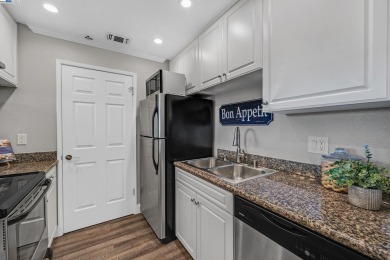 Rarely available first-floor condo in the gated Siena Hills on Canyon Lakes Country Club in California - for sale on GolfHomes.com, golf home, golf lot