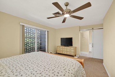 This updated first-floor condo combines comfort, security, and on Atlantis Golf Club in Florida - for sale on GolfHomes.com, golf home, golf lot