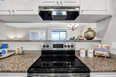 Rarely available first-floor condo in the gated Siena Hills on Canyon Lakes Country Club in California - for sale on GolfHomes.com, golf home, golf lot
