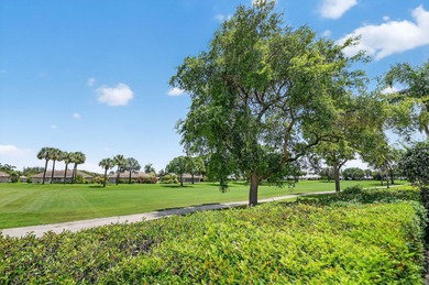 This updated first-floor condo combines comfort, security, and on Atlantis Golf Club in Florida - for sale on GolfHomes.com, golf home, golf lot