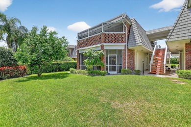 This updated first-floor condo combines comfort, security, and on Atlantis Golf Club in Florida - for sale on GolfHomes.com, golf home, golf lot