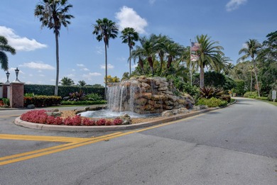 This updated first-floor condo combines comfort, security, and on Atlantis Golf Club in Florida - for sale on GolfHomes.com, golf home, golf lot