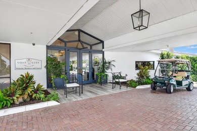 This updated first-floor condo combines comfort, security, and on Atlantis Golf Club in Florida - for sale on GolfHomes.com, golf home, golf lot