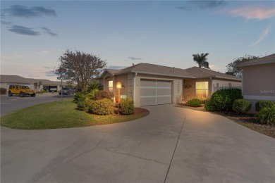 This charming 2/2 ROSEMONT courtyard villa, located in the on The Links of Spruce Creek in Florida - for sale on GolfHomes.com, golf home, golf lot