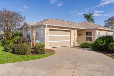 This charming 2/2 ROSEMONT courtyard villa, located in the on The Links of Spruce Creek in Florida - for sale on GolfHomes.com, golf home, golf lot