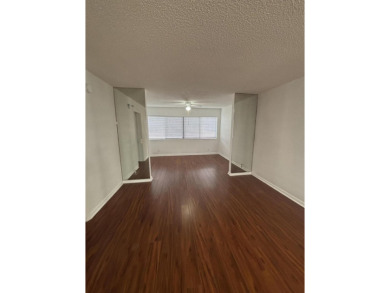 Beautiful first floor unit 2 beds/ 2 baths with a lake view in a on Forest Oaks Golf Club in Florida - for sale on GolfHomes.com, golf home, golf lot