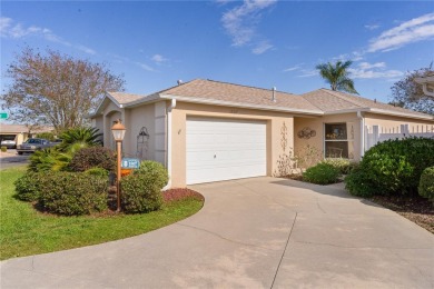 This charming 2/2 ROSEMONT courtyard villa, located in the on The Links of Spruce Creek in Florida - for sale on GolfHomes.com, golf home, golf lot