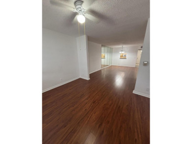 Beautiful first floor unit 2 beds/ 2 baths with a lake view in a on Forest Oaks Golf Club in Florida - for sale on GolfHomes.com, golf home, golf lot