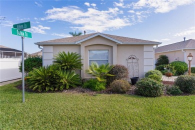 This charming 2/2 ROSEMONT courtyard villa, located in the on The Links of Spruce Creek in Florida - for sale on GolfHomes.com, golf home, golf lot