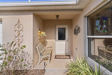 This charming 2/2 ROSEMONT courtyard villa, located in the on The Links of Spruce Creek in Florida - for sale on GolfHomes.com, golf home, golf lot