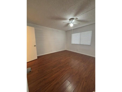Beautiful first floor unit 2 beds/ 2 baths with a lake view in a on Forest Oaks Golf Club in Florida - for sale on GolfHomes.com, golf home, golf lot