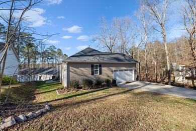 Situated on a prime corner lot in the highly sought-after gated on Carolina Trace Country Club in North Carolina - for sale on GolfHomes.com, golf home, golf lot