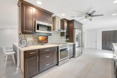 Welcome to a truly unique property nestled in the Woodlake on Deer Creek Golf Club in Florida - for sale on GolfHomes.com, golf home, golf lot