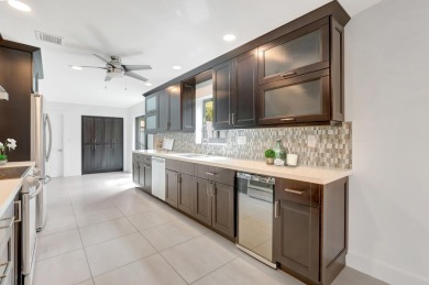 Welcome to a truly unique property nestled in the Woodlake on Deer Creek Golf Club in Florida - for sale on GolfHomes.com, golf home, golf lot