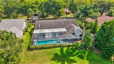 Welcome to a truly unique property nestled in the Woodlake on Deer Creek Golf Club in Florida - for sale on GolfHomes.com, golf home, golf lot