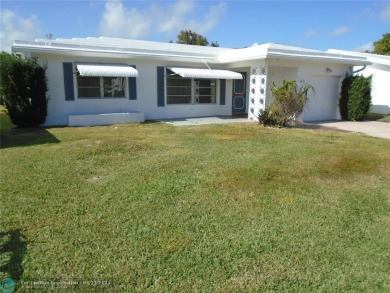Larger model home in the community of Leisureville. This on Leisureville Community Association in Florida - for sale on GolfHomes.com, golf home, golf lot