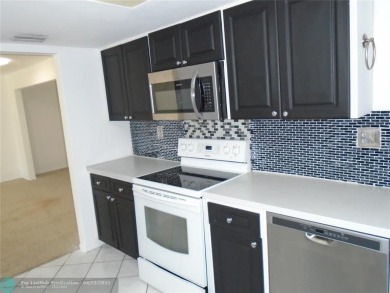 Larger model home in the community of Leisureville. This on Leisureville Community Association in Florida - for sale on GolfHomes.com, golf home, golf lot