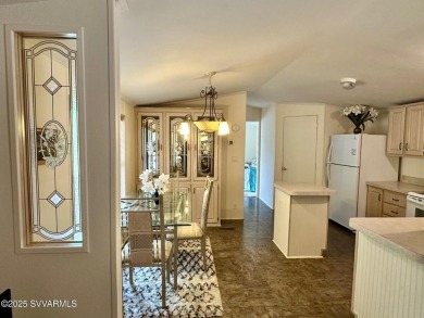 Nestled among the pines, this charming 2-bedroom, 2-bath home on Pine Shadows Golf Course in Arizona - for sale on GolfHomes.com, golf home, golf lot