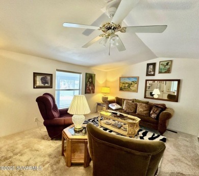 Nestled among the pines, this charming 2-bedroom, 2-bath home on Pine Shadows Golf Course in Arizona - for sale on GolfHomes.com, golf home, golf lot