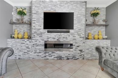 One or more photo(s) has been virtually staged. This home can be on The Oasis Club at Champions Gate in Florida - for sale on GolfHomes.com, golf home, golf lot