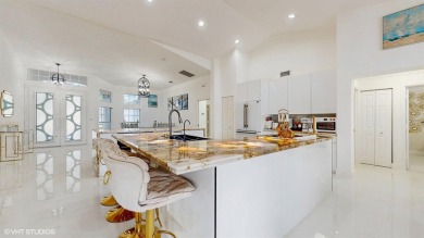 Marvelous paradise home located in the Heart of Wellington. Step on Greenview Cove Golf Club in Florida - for sale on GolfHomes.com, golf home, golf lot