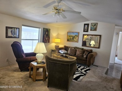 Nestled among the pines, this charming 2-bedroom, 2-bath home on Pine Shadows Golf Course in Arizona - for sale on GolfHomes.com, golf home, golf lot