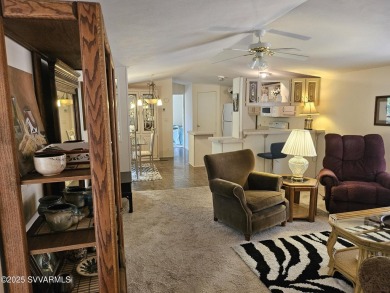 Nestled among the pines, this charming 2-bedroom, 2-bath home on Pine Shadows Golf Course in Arizona - for sale on GolfHomes.com, golf home, golf lot