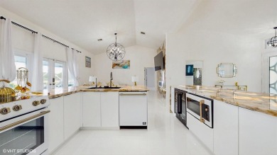 Marvelous paradise home located in the Heart of Wellington. Step on Greenview Cove Golf Club in Florida - for sale on GolfHomes.com, golf home, golf lot