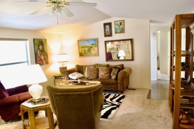 Nestled among the pines, this charming 2-bedroom, 2-bath home on Pine Shadows Golf Course in Arizona - for sale on GolfHomes.com, golf home, golf lot