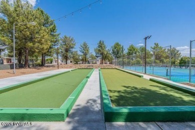 Nestled among the pines, this charming 2-bedroom, 2-bath home on Pine Shadows Golf Course in Arizona - for sale on GolfHomes.com, golf home, golf lot