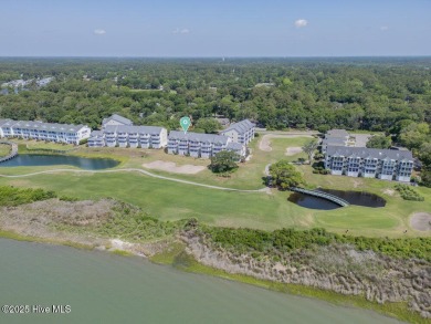 Experience coastal living at its finest in this beautifully on Brick Landing Plantation Yacht and Golf Club in North Carolina - for sale on GolfHomes.com, golf home, golf lot
