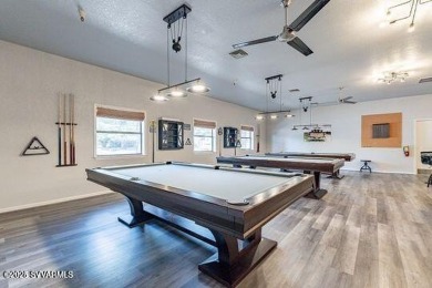 Nestled among the pines, this charming 2-bedroom, 2-bath home on Pine Shadows Golf Course in Arizona - for sale on GolfHomes.com, golf home, golf lot
