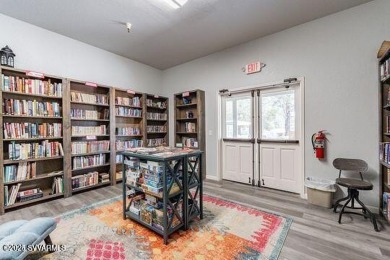 Nestled among the pines, this charming 2-bedroom, 2-bath home on Pine Shadows Golf Course in Arizona - for sale on GolfHomes.com, golf home, golf lot