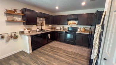 LOCATION ! LOCATION ! LOCATION ! WELL MAINTAINED HOME AND on Caloosa Greens Executive Golf Course in Florida - for sale on GolfHomes.com, golf home, golf lot