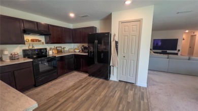LOCATION ! LOCATION ! LOCATION ! WELL MAINTAINED HOME AND on Caloosa Greens Executive Golf Course in Florida - for sale on GolfHomes.com, golf home, golf lot