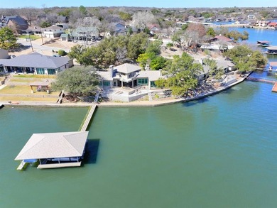 UNBELIEVABLE WATERFRONT home on Lake Granbury! This on De Cordova Bend Country Club in Texas - for sale on GolfHomes.com, golf home, golf lot