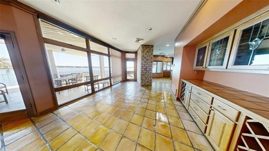 UNBELIEVABLE WATERFRONT home on Lake Granbury! This on De Cordova Bend Country Club in Texas - for sale on GolfHomes.com, golf home, golf lot