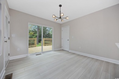 Absolutely stunning and fully remodeled from top to bottom in on Burning Ridge Golf Course in South Carolina - for sale on GolfHomes.com, golf home, golf lot